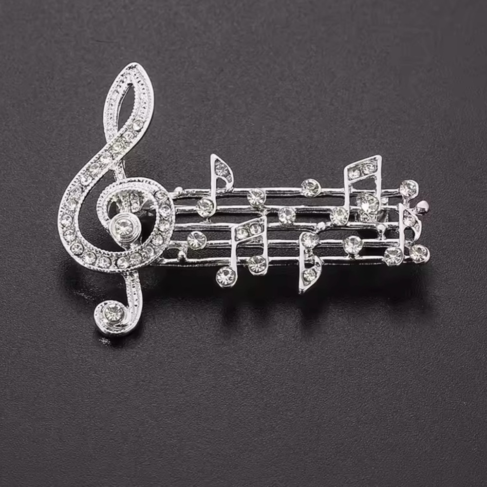 Elegant Silver Music Note Brooch